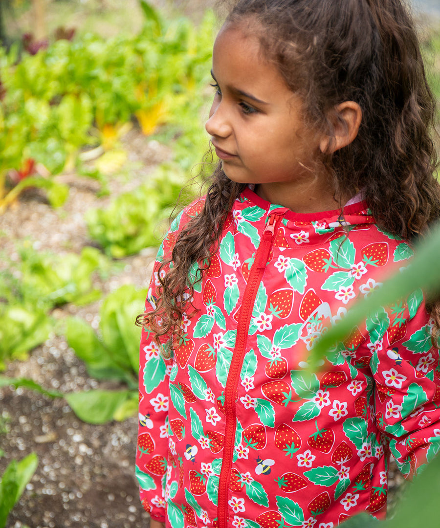 Frugi pink rain jacket strawberry pals design.