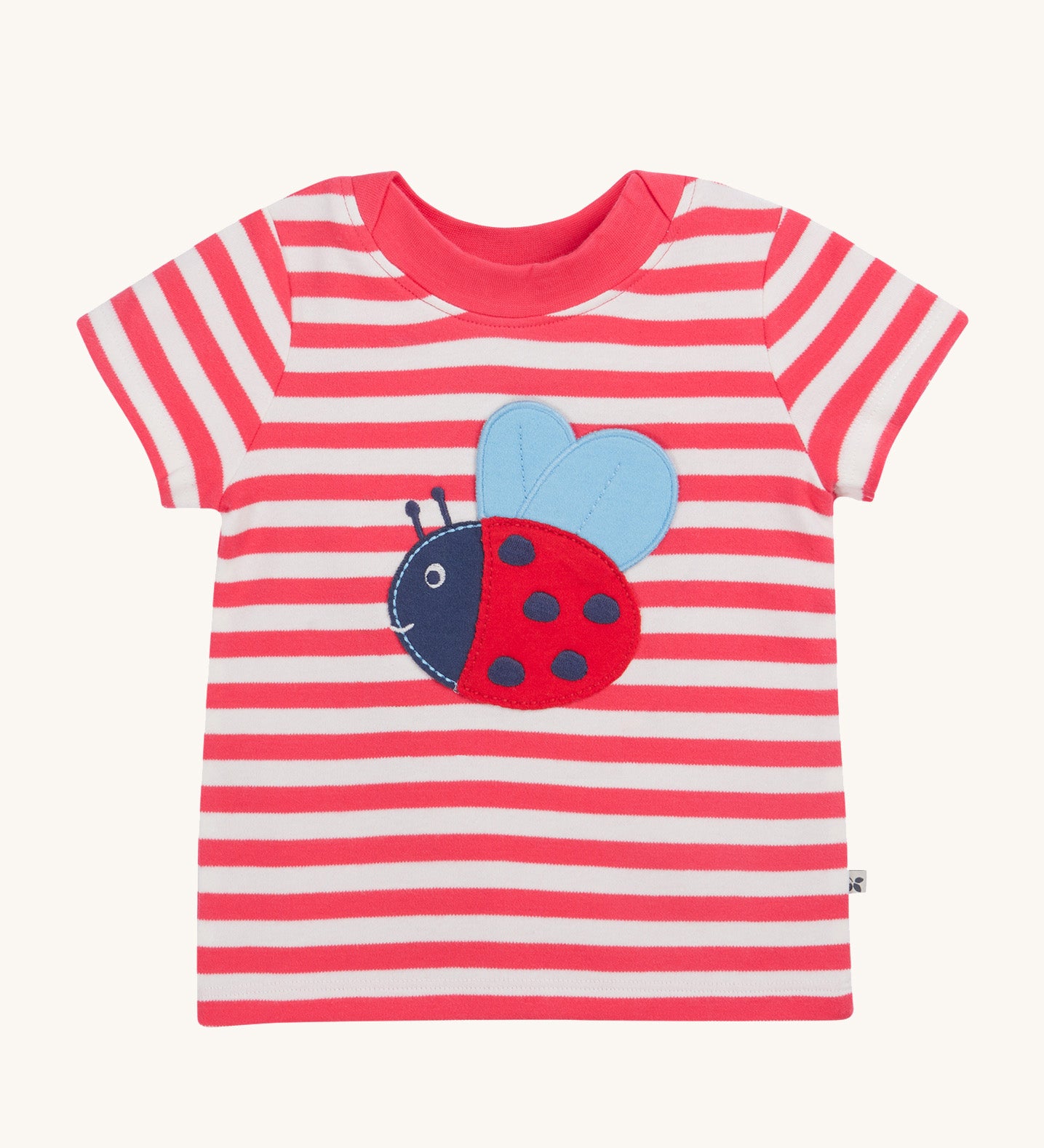 Frugi pink stripe short sleeve top ladybird design on a cream background.