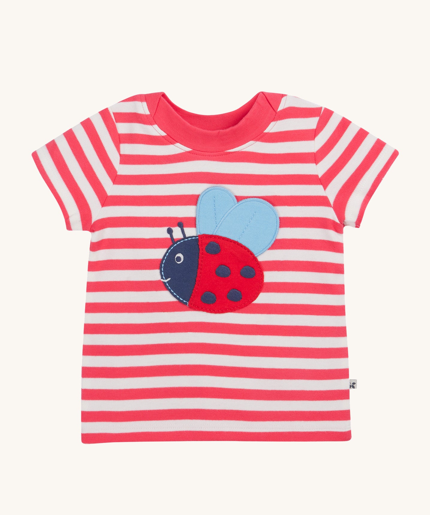 Frugi pink stripe short sleeve top ladybird design on a cream background.