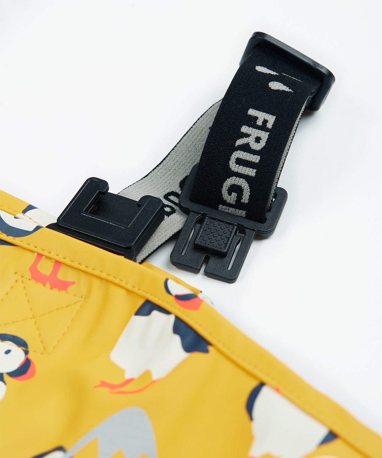 Frugi yellow puddle buster trousers puffin design shoulder strap detail