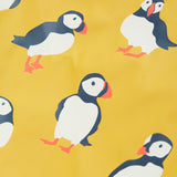 Frugi yellow puddle buster trousers puffin design print detail