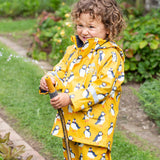 Frugi kids puddle buster jacket yellow with a puffin design 