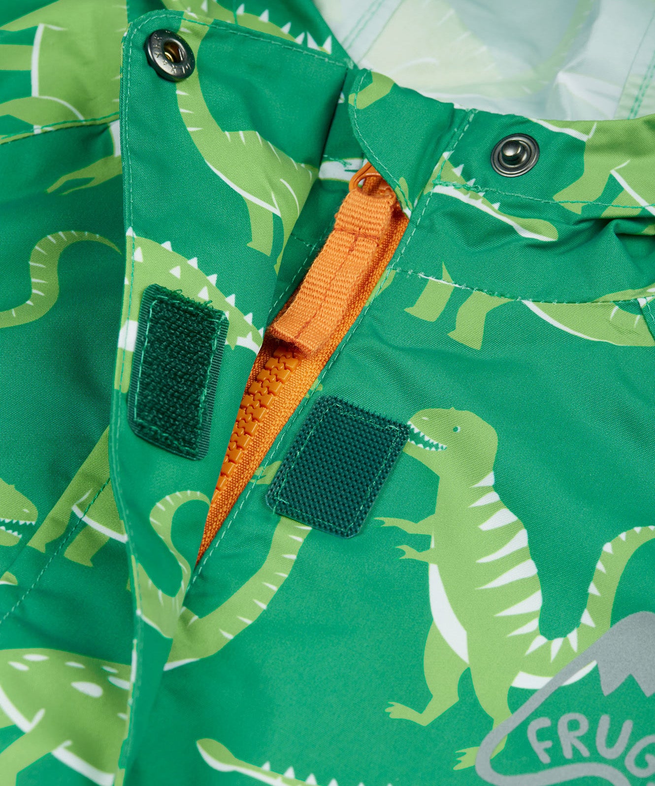 Frugi green all in one suit dino roar front velcro and zip detail