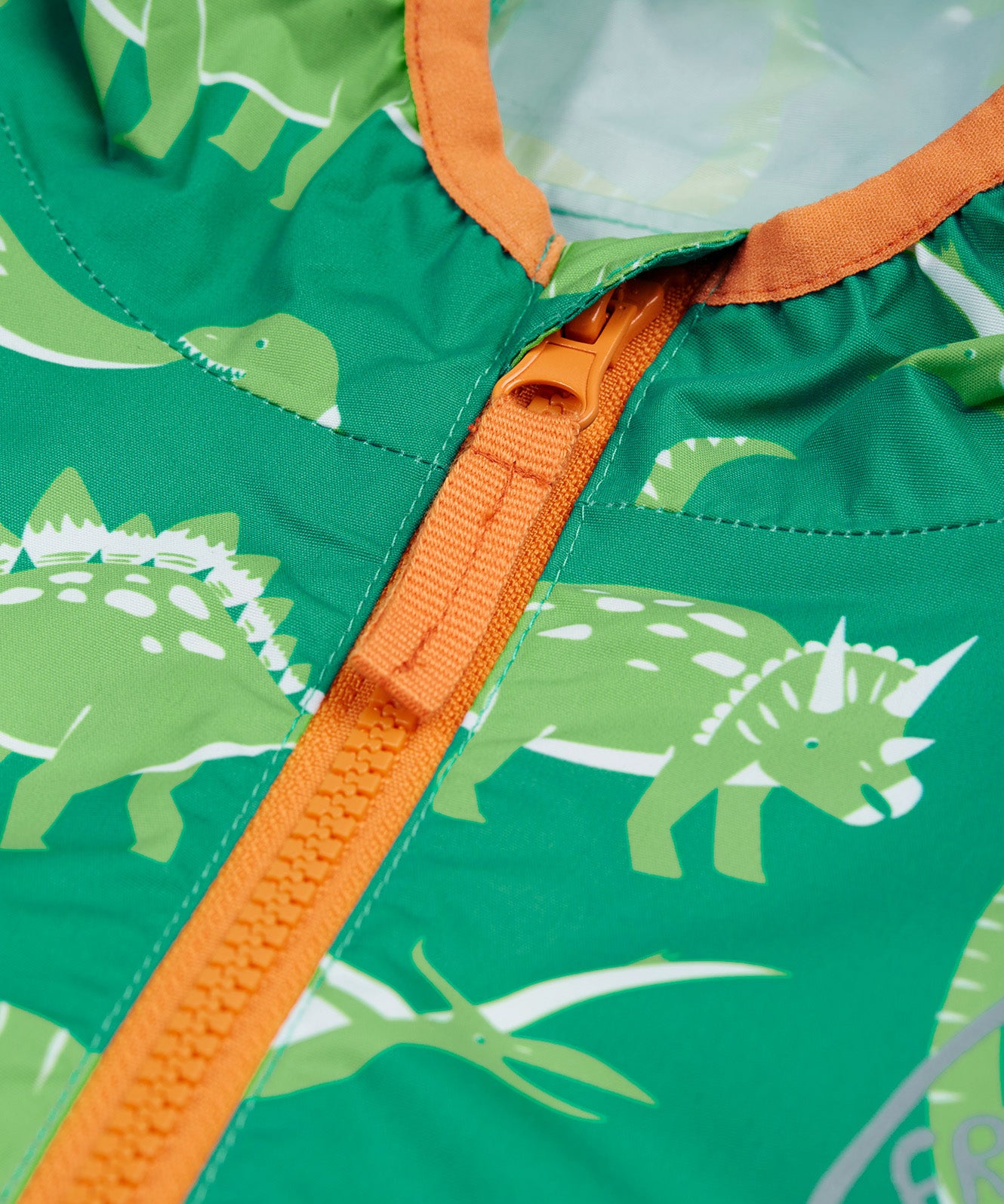 Frugi green rain jacket dino roar zip detail