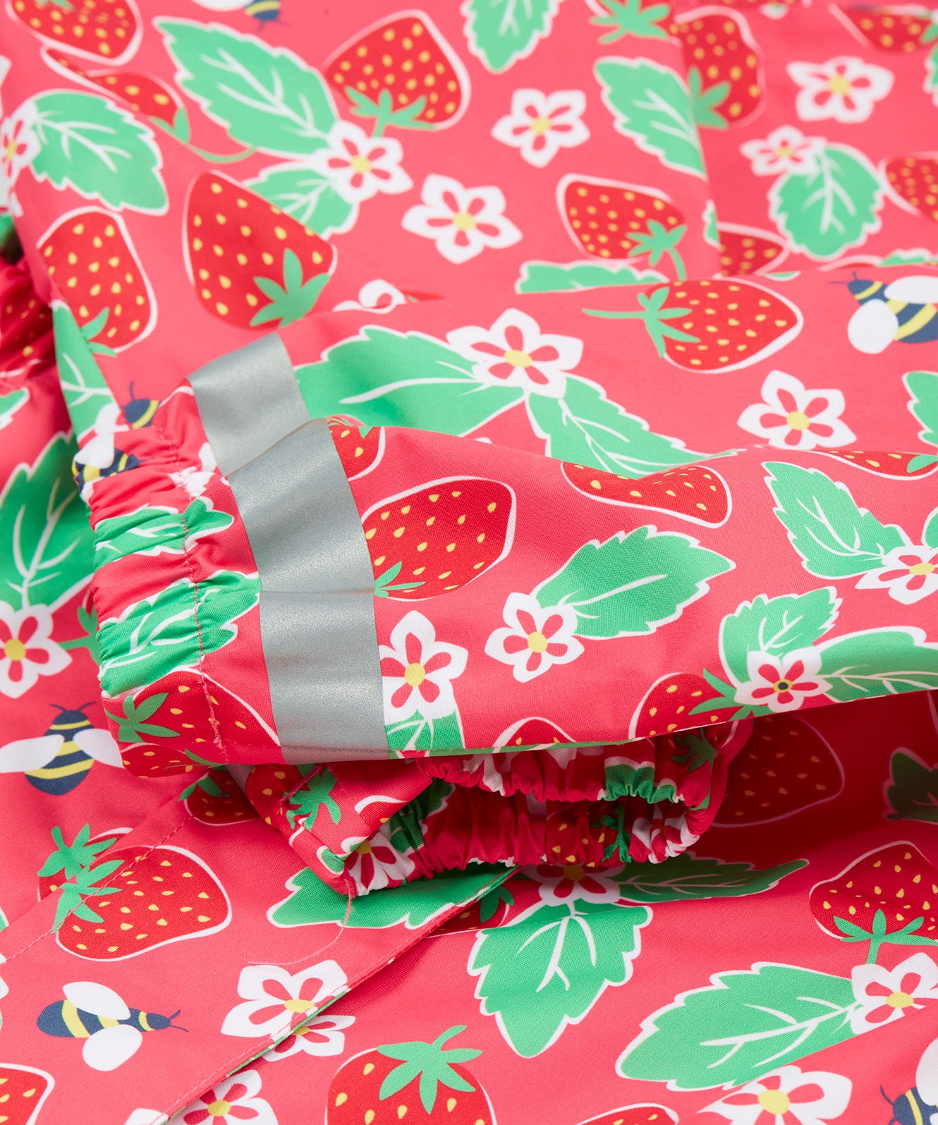 Frugi pink all in one suit strawberry arm cuff detail