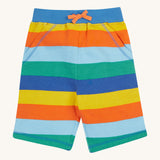 Frugi rainbow coloured bold stripes shorts on a cream background.