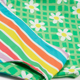 Frugi reversible tankini in a green daisy and summer stripe design detail