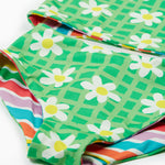 Frugi reversible tankini in a green daisy and summer stripe design daisy print detail