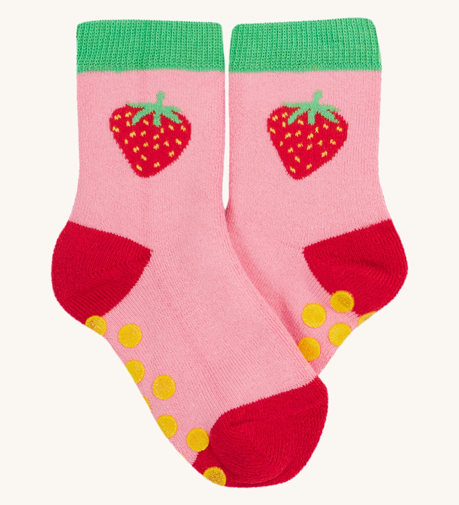 Frugi 2 pack grippy socks strawberry design on a cream background