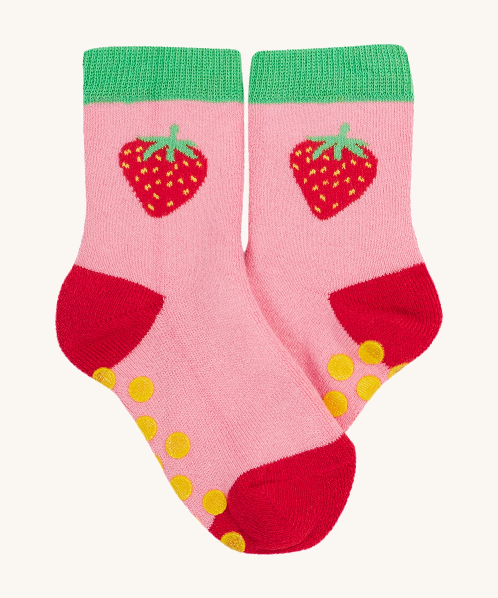 Frugi 2 pack grippy socks strawberry design on a cream background