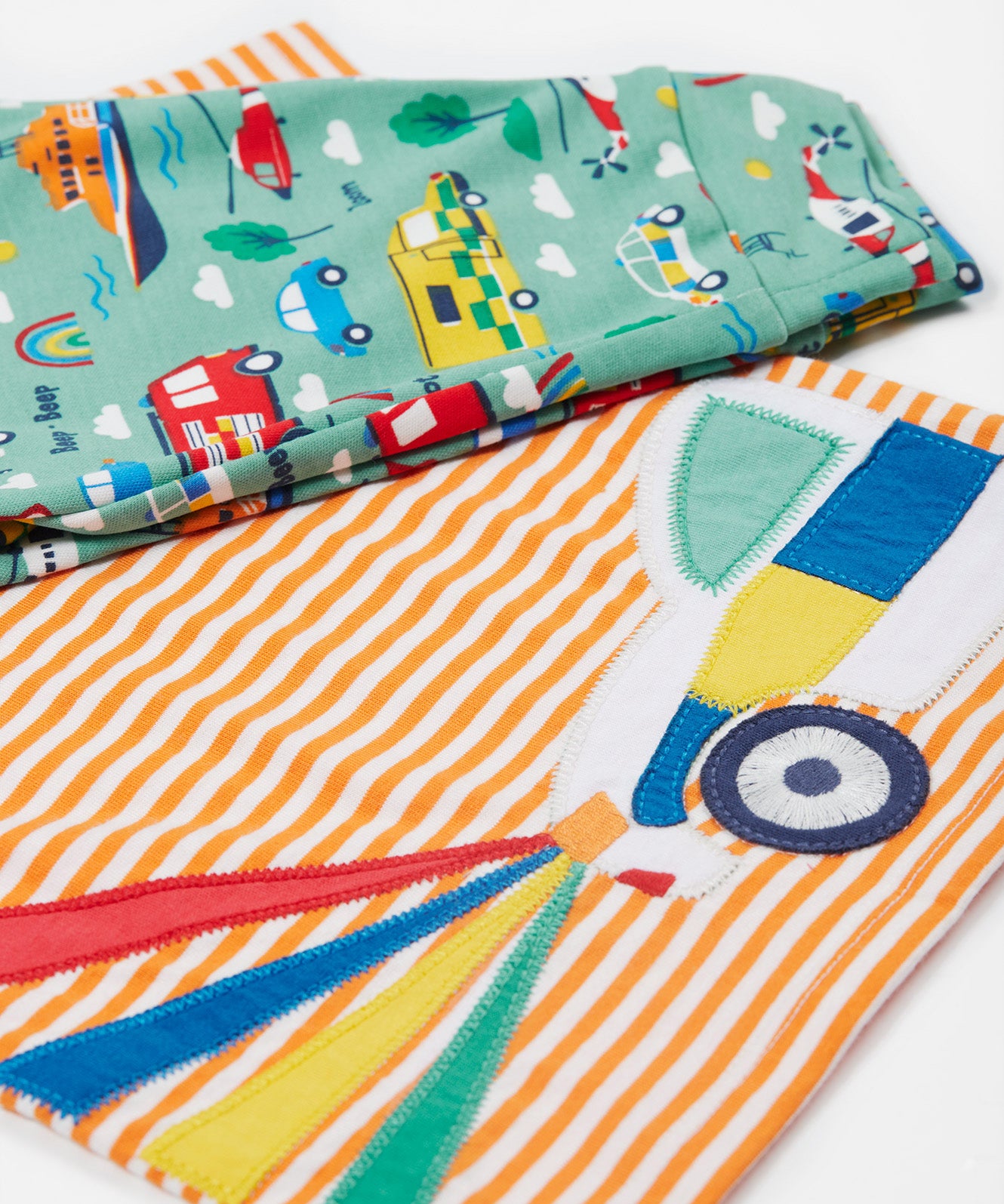 Frugi orange stripe to the rescue design front and leg  print detail