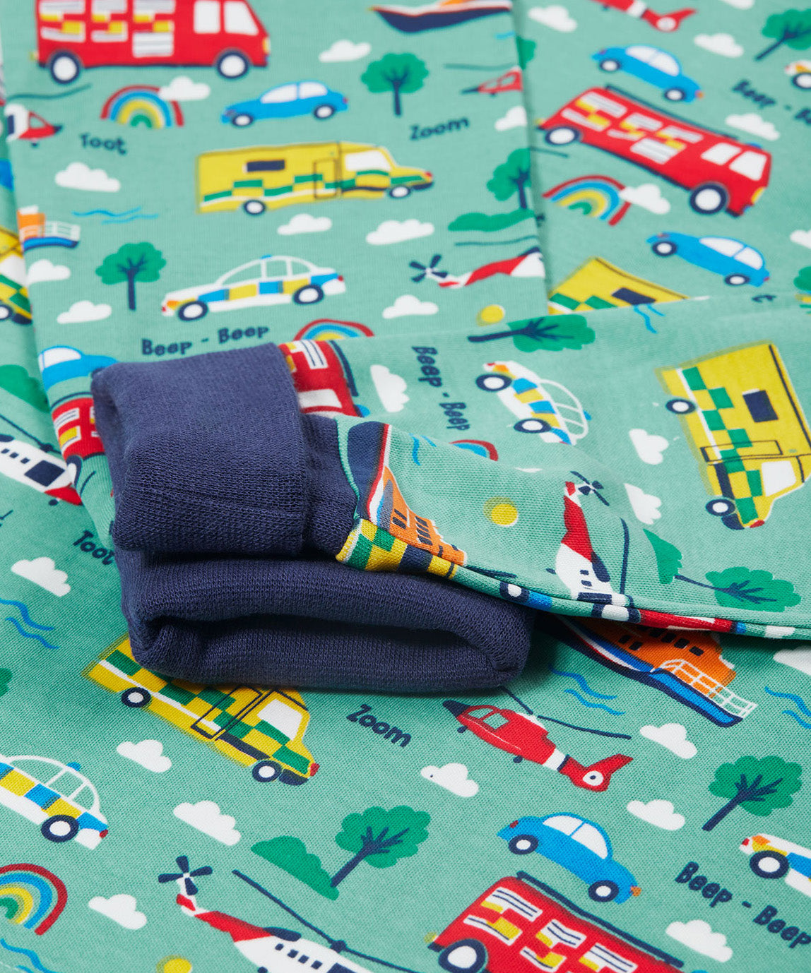 Frugi green pyjama set to the rescue top cuff detail