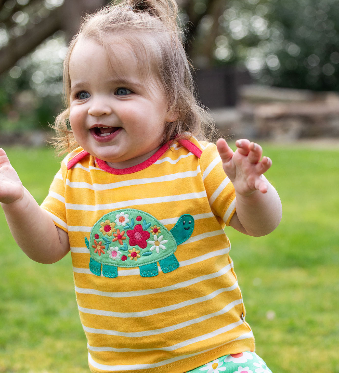 Frugi yellow striped tshirt tortoise and flower design 