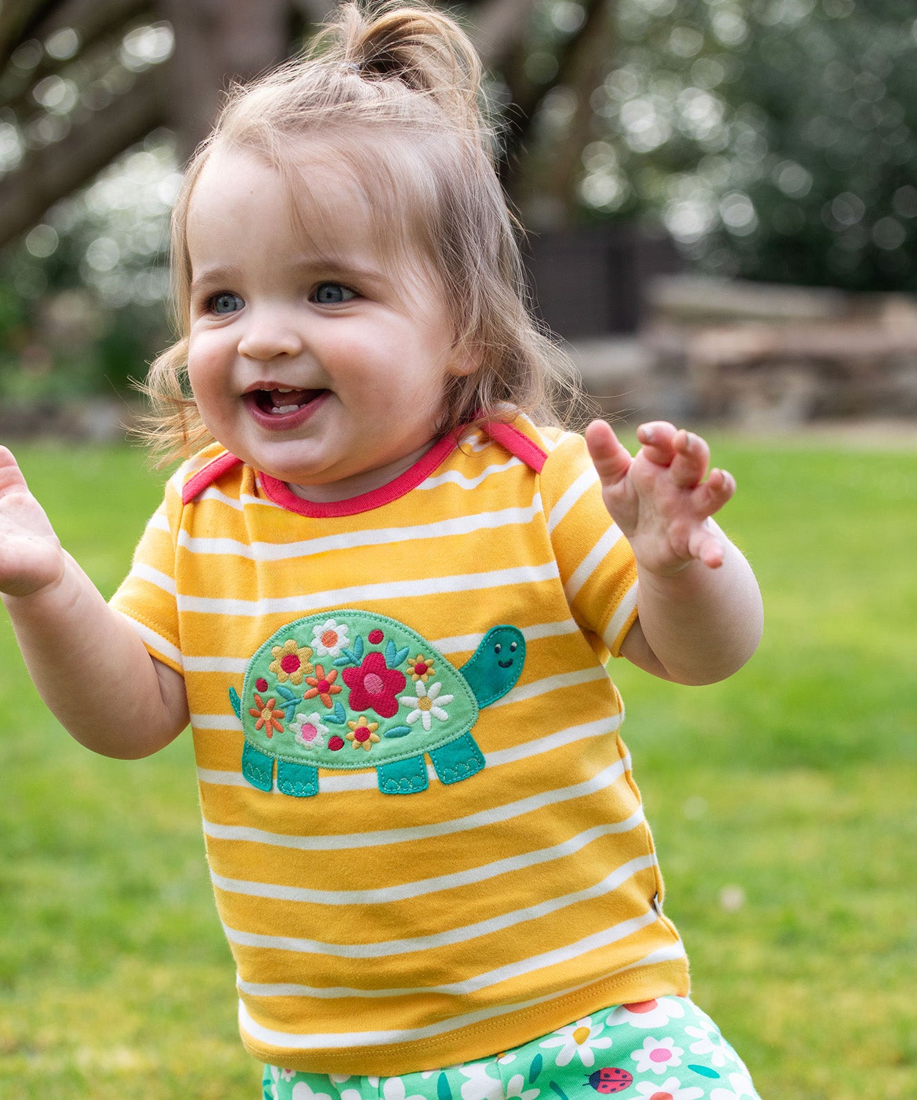 Frugi yellow striped tshirt tortoise and flower design 