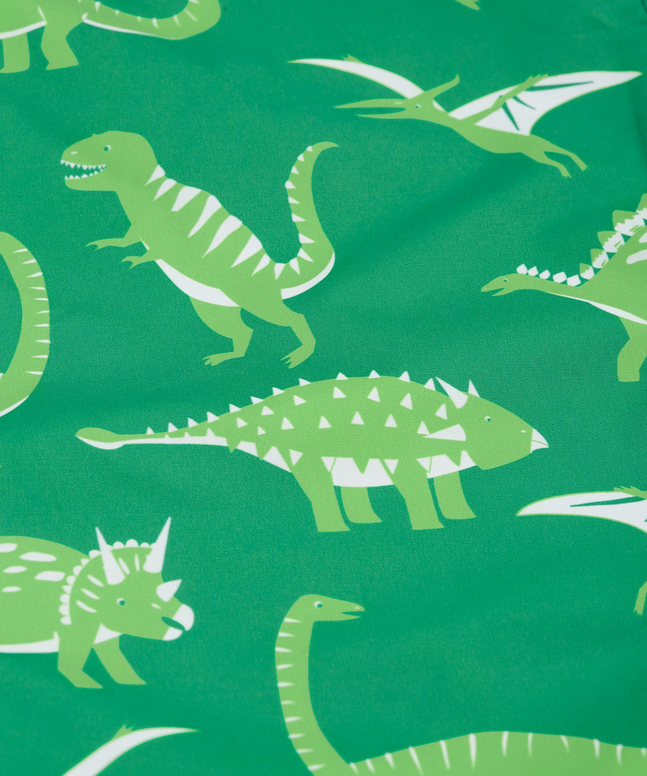 Frugi green rain and shine trousers dino roar design print detail