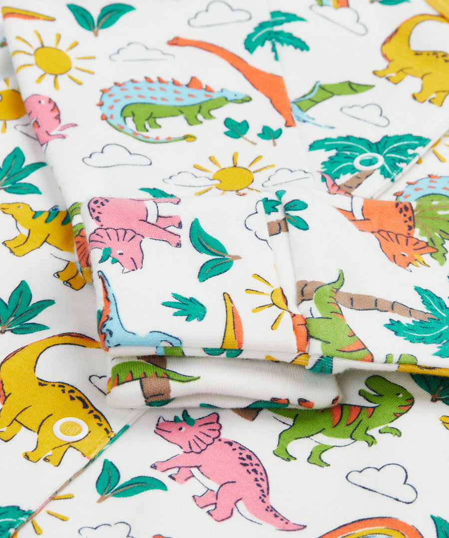 Frugi white baby grow dino land cuff detail