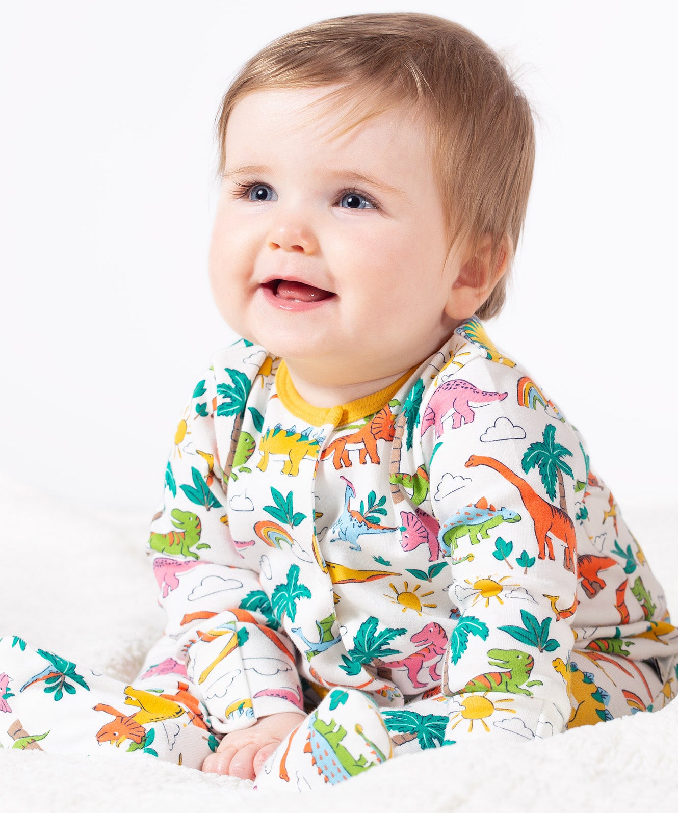 Frugi white baby grow dino land design