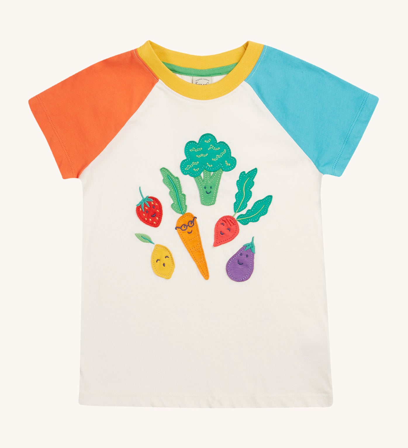 Frugi white short sleeve top, blue and red sleeves veg patch design on a cream background