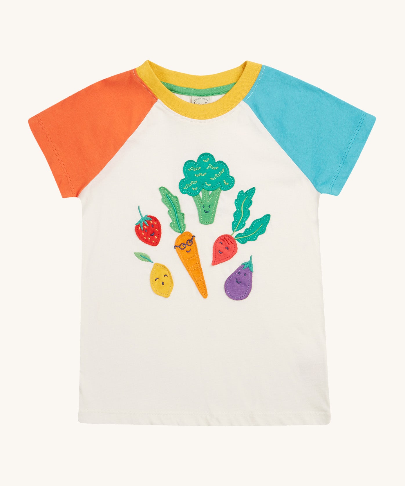 Frugi white short sleeve top, blue and red sleeves veg patch design on a cream background