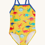 Frugi yellow swim suit dino roar design on a cream background.