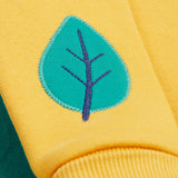 Frugi yellow easy on jumper dino leaf detail