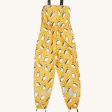 Frugi yellow puddle buster trousers puffin design on a cream background.