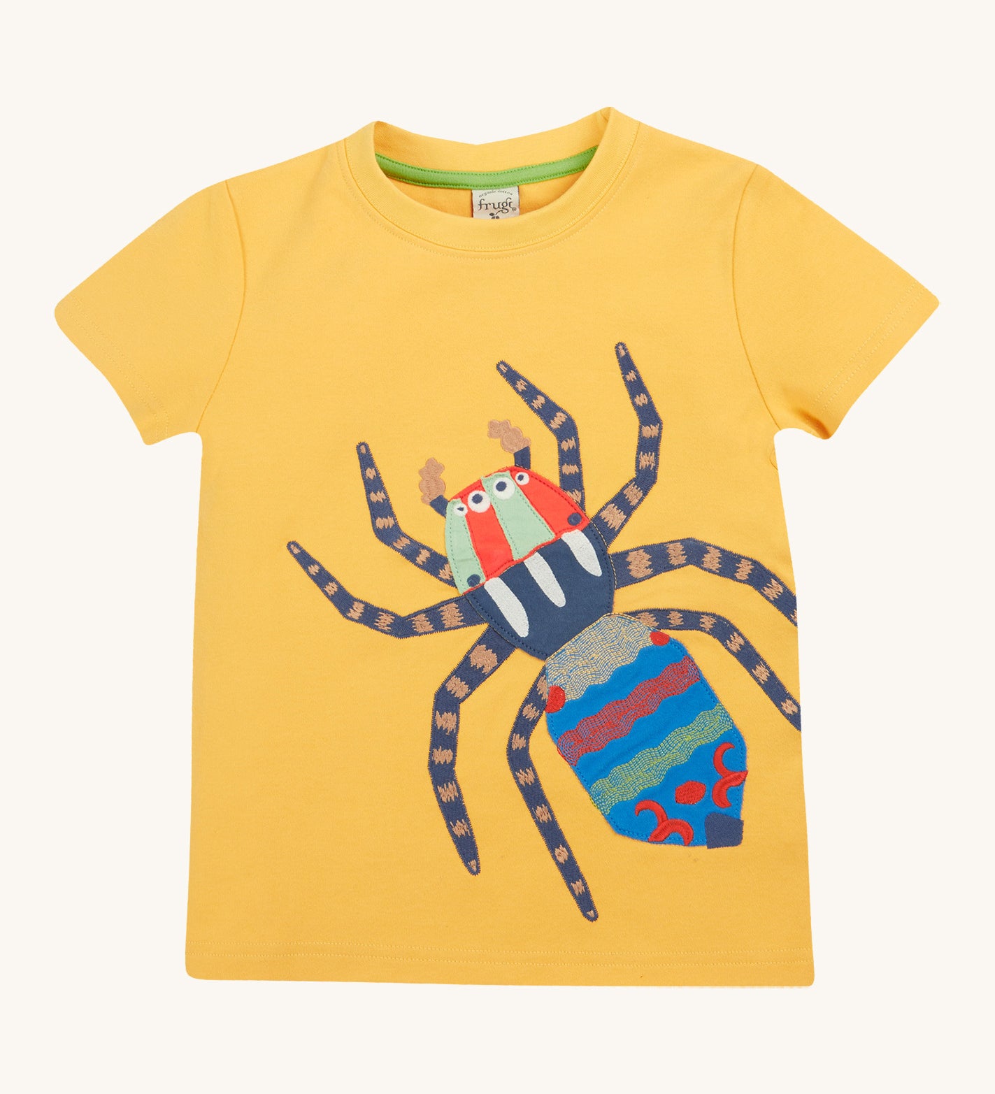 Frugi yellow short sleeve tshirt spider design on a cream background.