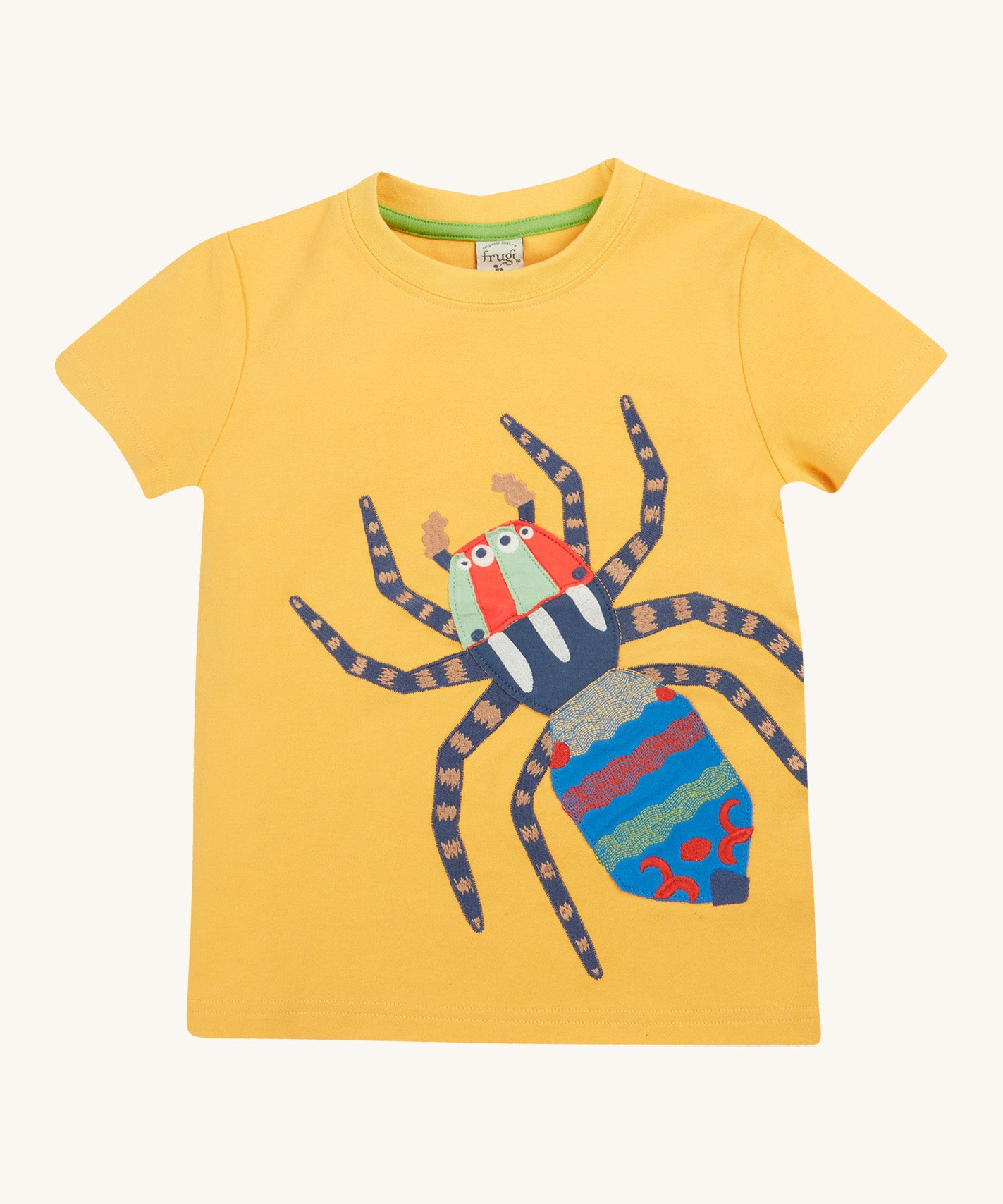 Frugi yellow short sleeve tshirt spider design on a cream background.