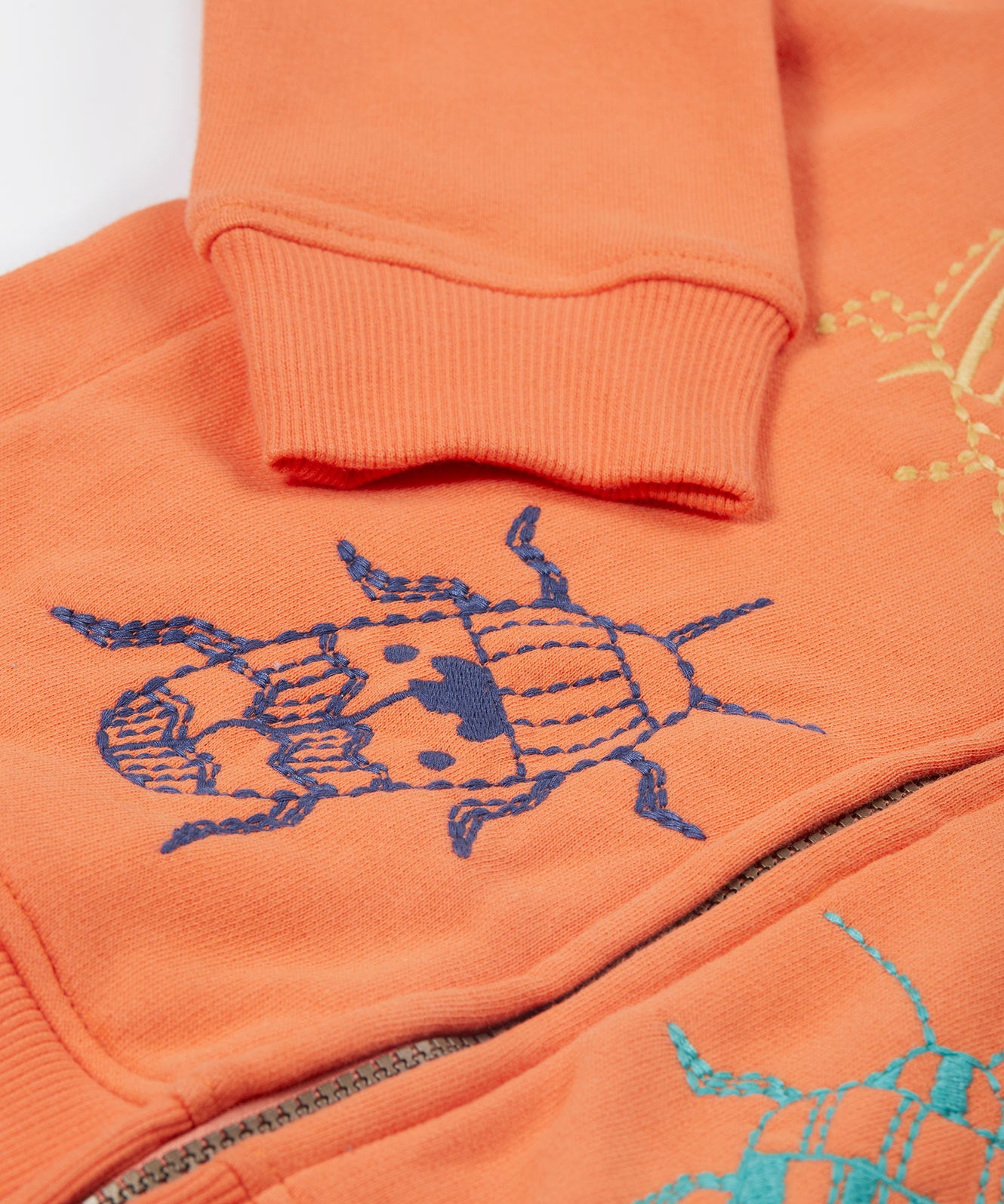 Frugi orange zip hoodie beetles design cuff detail