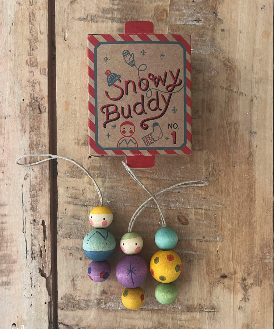 Grapat Wooden Christmas Ornaments - Snow Buddy. Beautifully hand made, and hand painted Christmas ornaments, with an heirloom quality to be used year after year. Snow Buddy consists of 3 snowman like ornaments, made from 3 round balls painted in various bright colours.