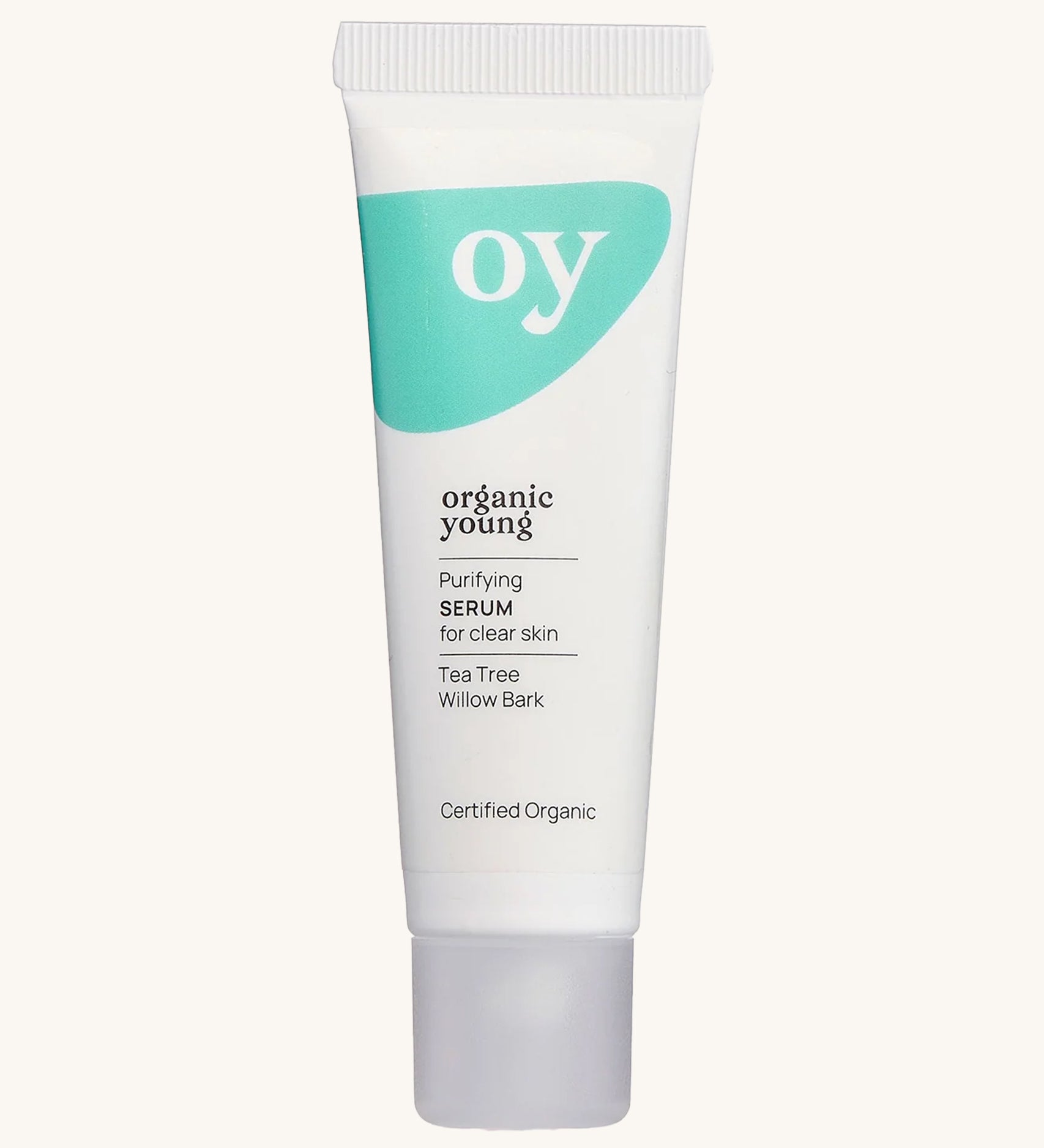 Green People OY! Organic Teen Purifying Serum - 30ml ina white tube, with a green wavy pattern on a cream background