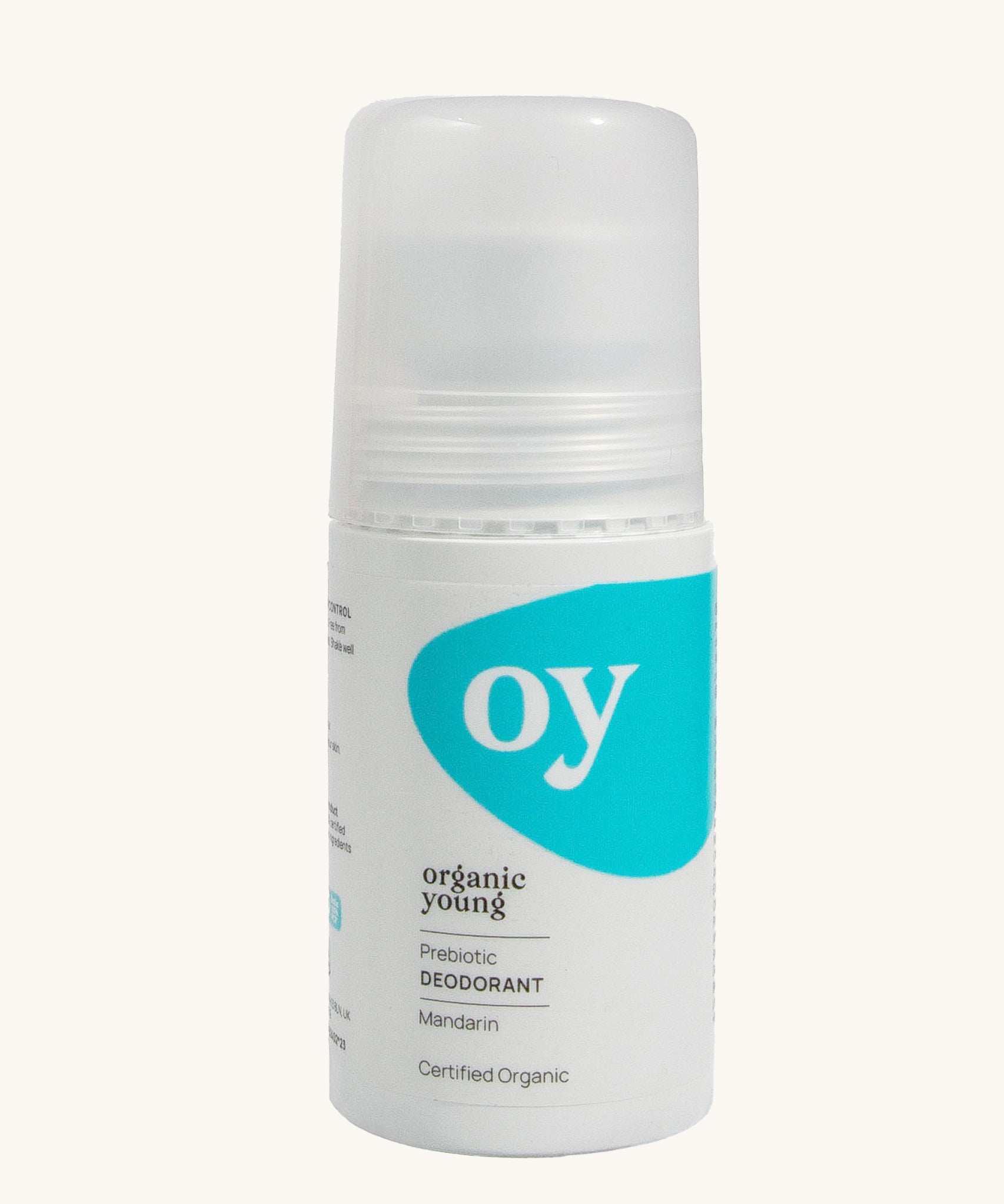 Green People OY! Organic Teen Deodorant - 75ml, is in a white roll on tube, which has a blue pattern on the front. The image is on a cream background