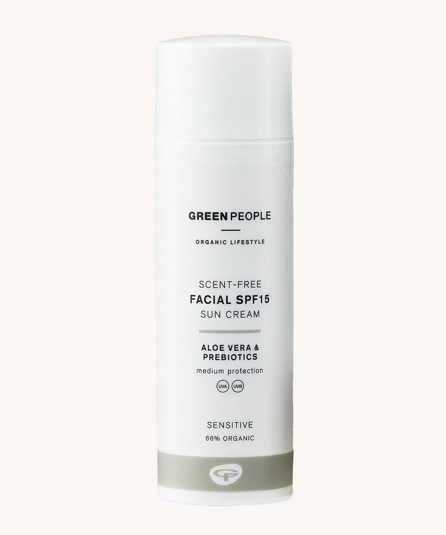 Green People Scent Free Facial SPF15 Sun Cream - 50ml, for sensitive skin, comes in a white tube with a grey stripe on the bottom. The image is on a cream background