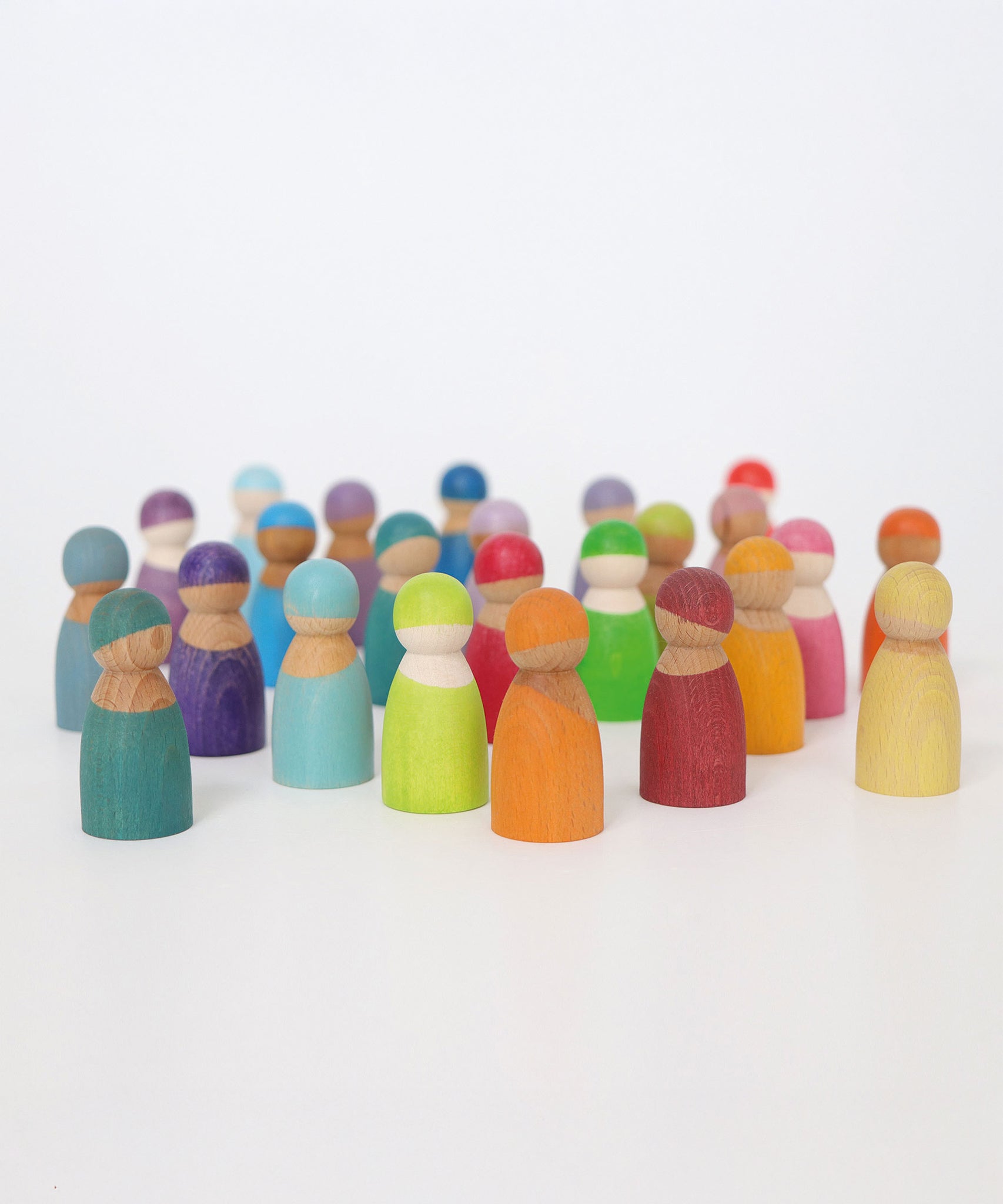 Grimm's 12 Pastel Friends and Grimm's Rainbow Friends mixed together. These wooden, small world play, open ended toys are the perfect size for little hands, and have a smooth rounded texture