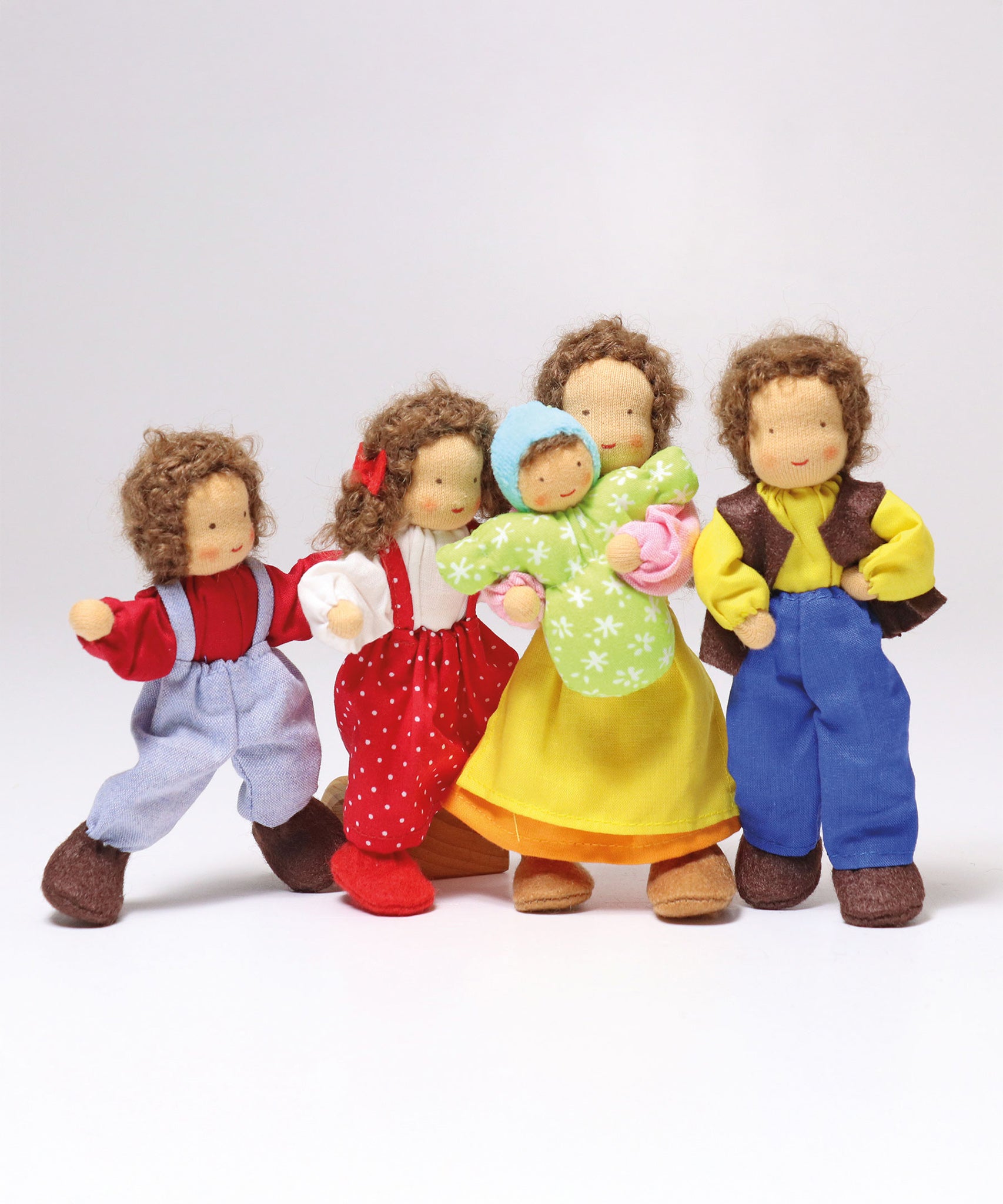 Grimm's Waldorf Doll collection. The image shows Baby Leo, Boy Peter, Girl Lana, Male Erle, 