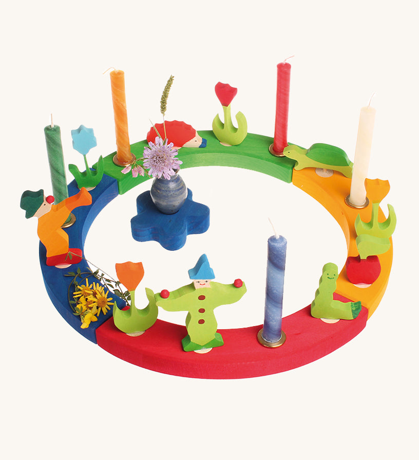 Grimm's 16-Hole Coloured Wooden Celebration Ring with candles and decorative figures