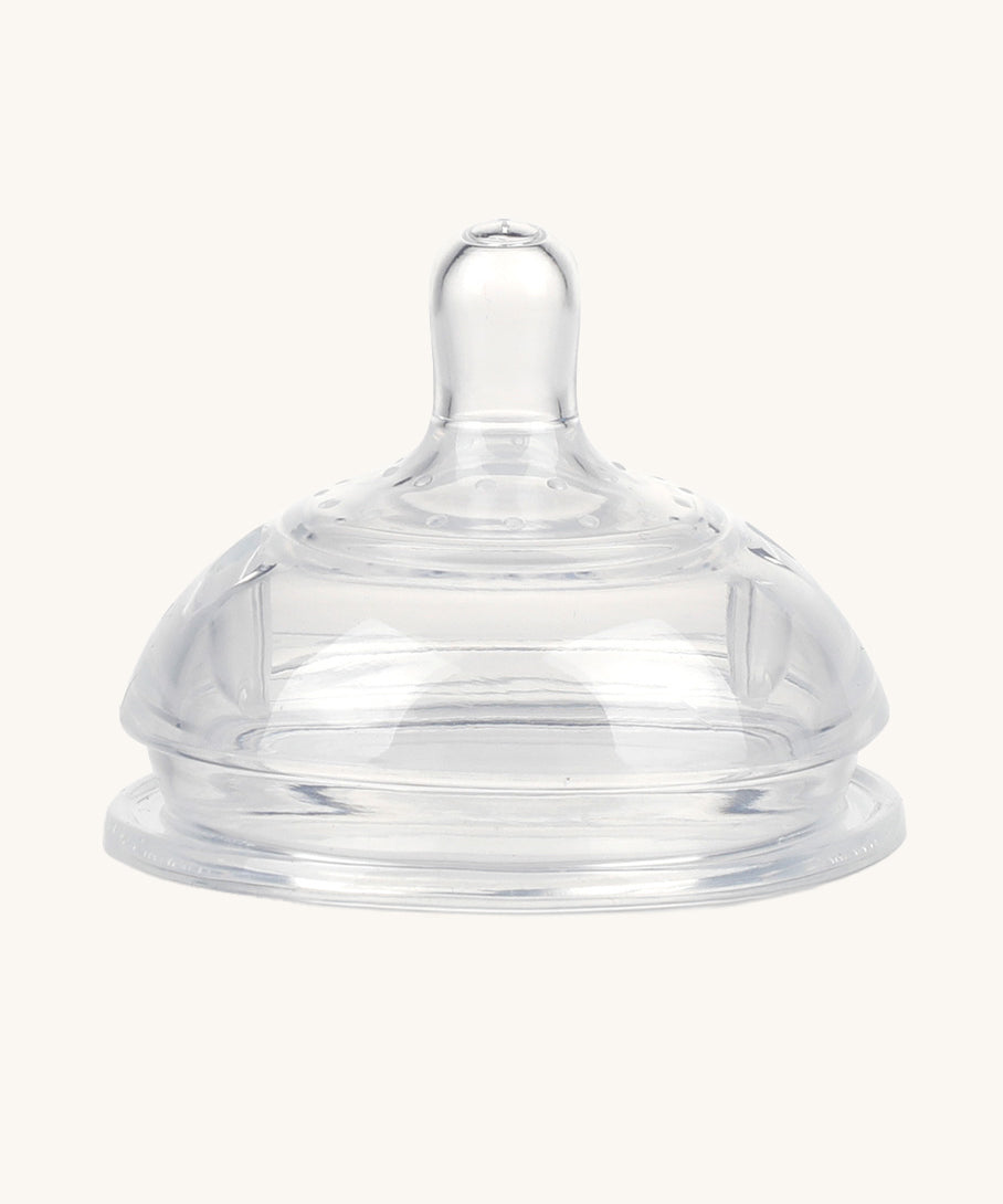 Generation 3 Silicone Bottle Anti-Colic Nipple. The Anti-Colic Bottle Nipple is compatible with all Gen. 3 Bottles. On a cream background