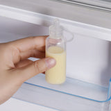 The Haakaa Silicone Colostrum Collector, being stored in the fridge