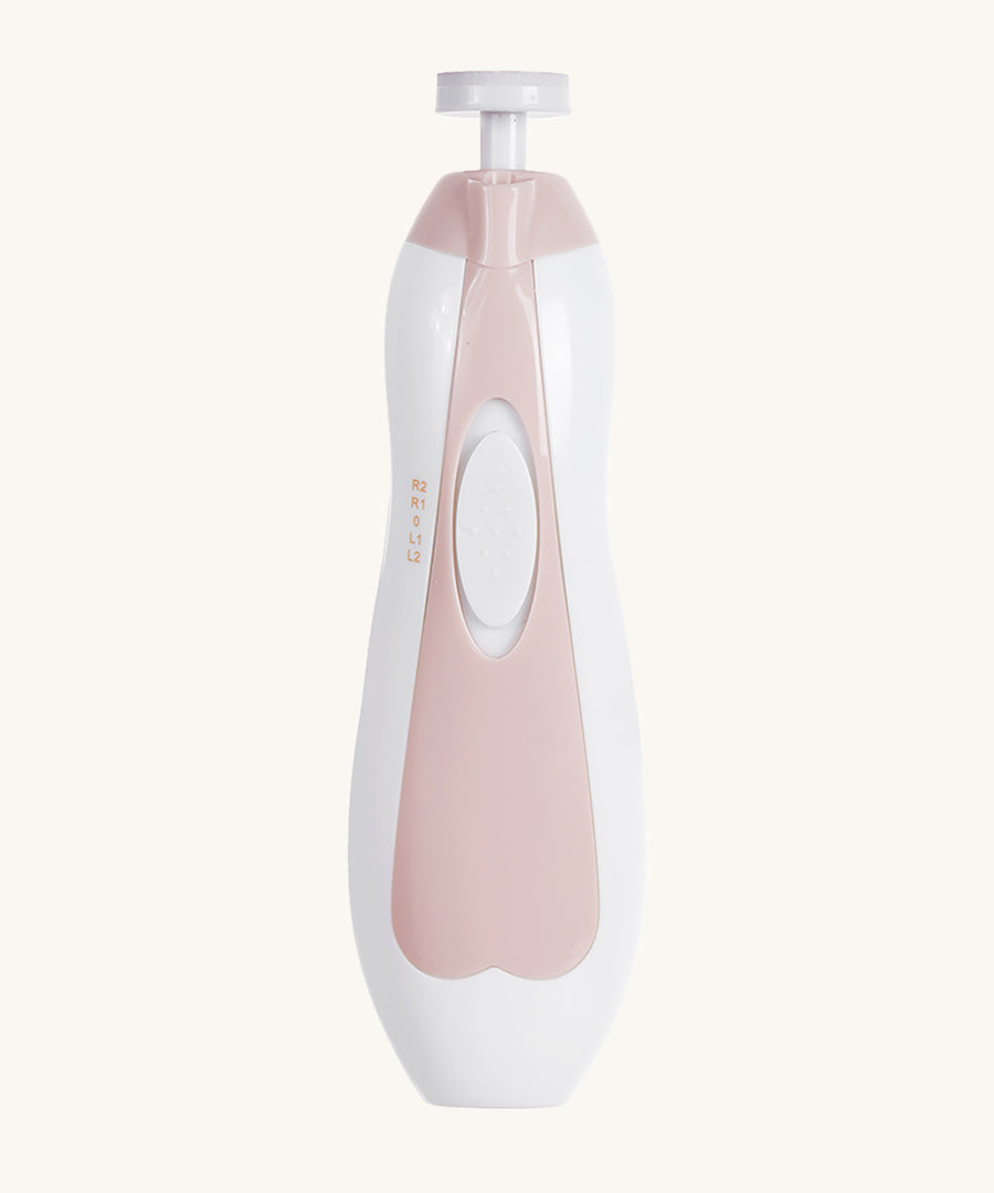 The Baby Nail Care Set, on a cream background. The Nail file is electric, with a push up switch to turn it on. The nail file also files in a left or right rotational direction.