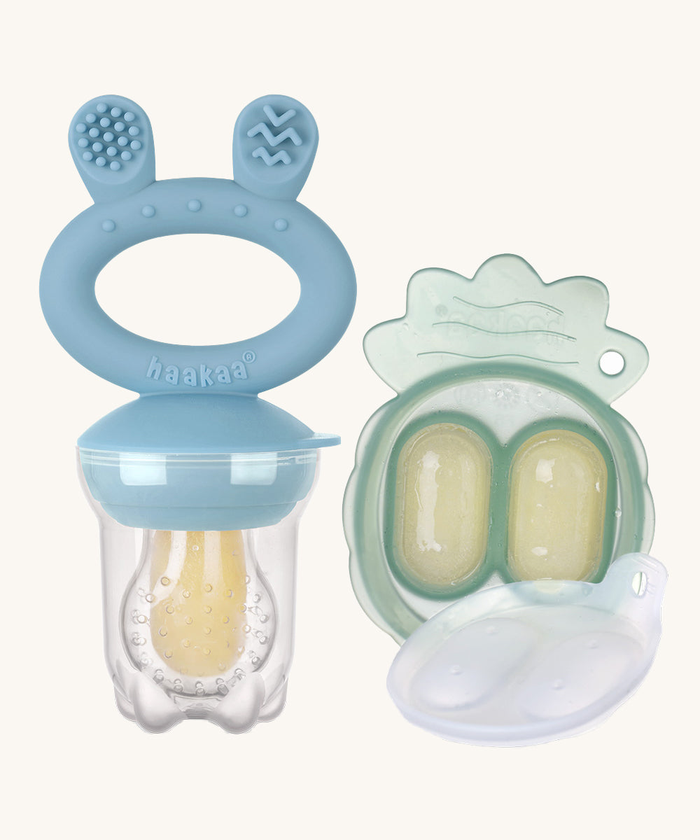 The Haakaa Fresh Food Feeder Mini Freeze and Feed set in blue, comes with a Nibble Tray, and a feeder. Both are freezable and the feeder is textured to sooth teething and sore gums