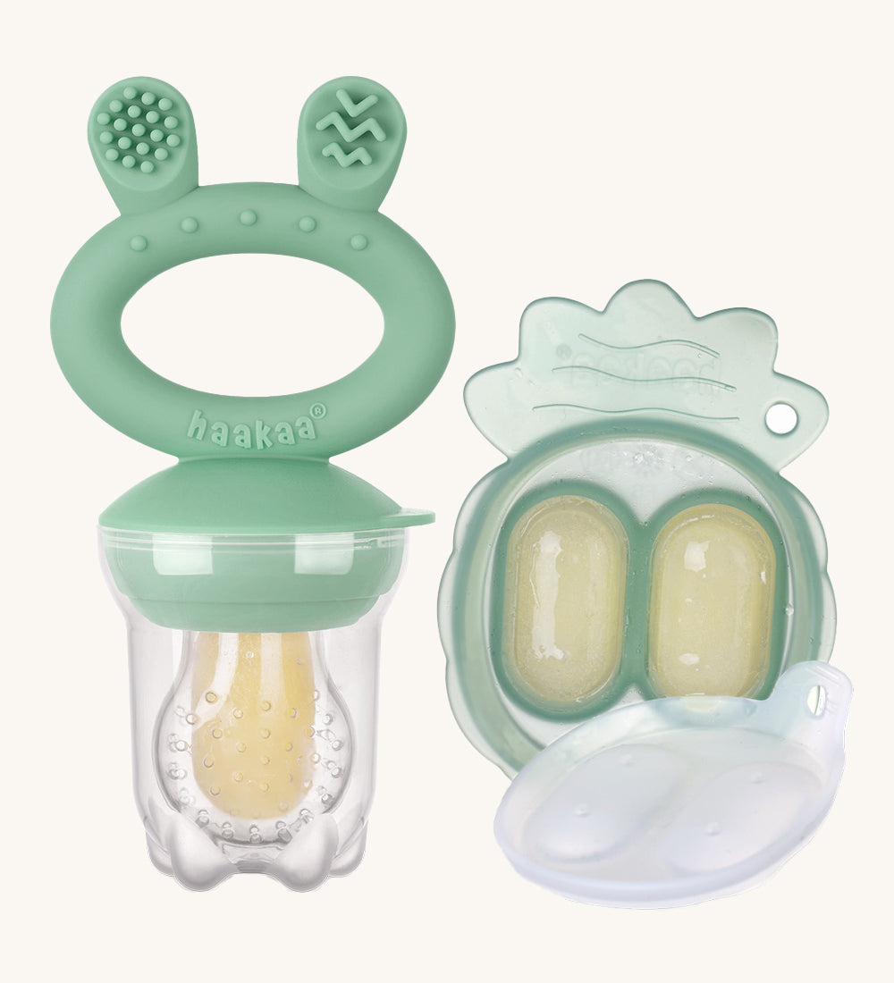 The Haakaa Fresh Food Feeder Mini Freeze and Feed set in green, comes with a Nibble Tray, and a feeder. Both are freezable and the feeder is textured to sooth teething and sore gums