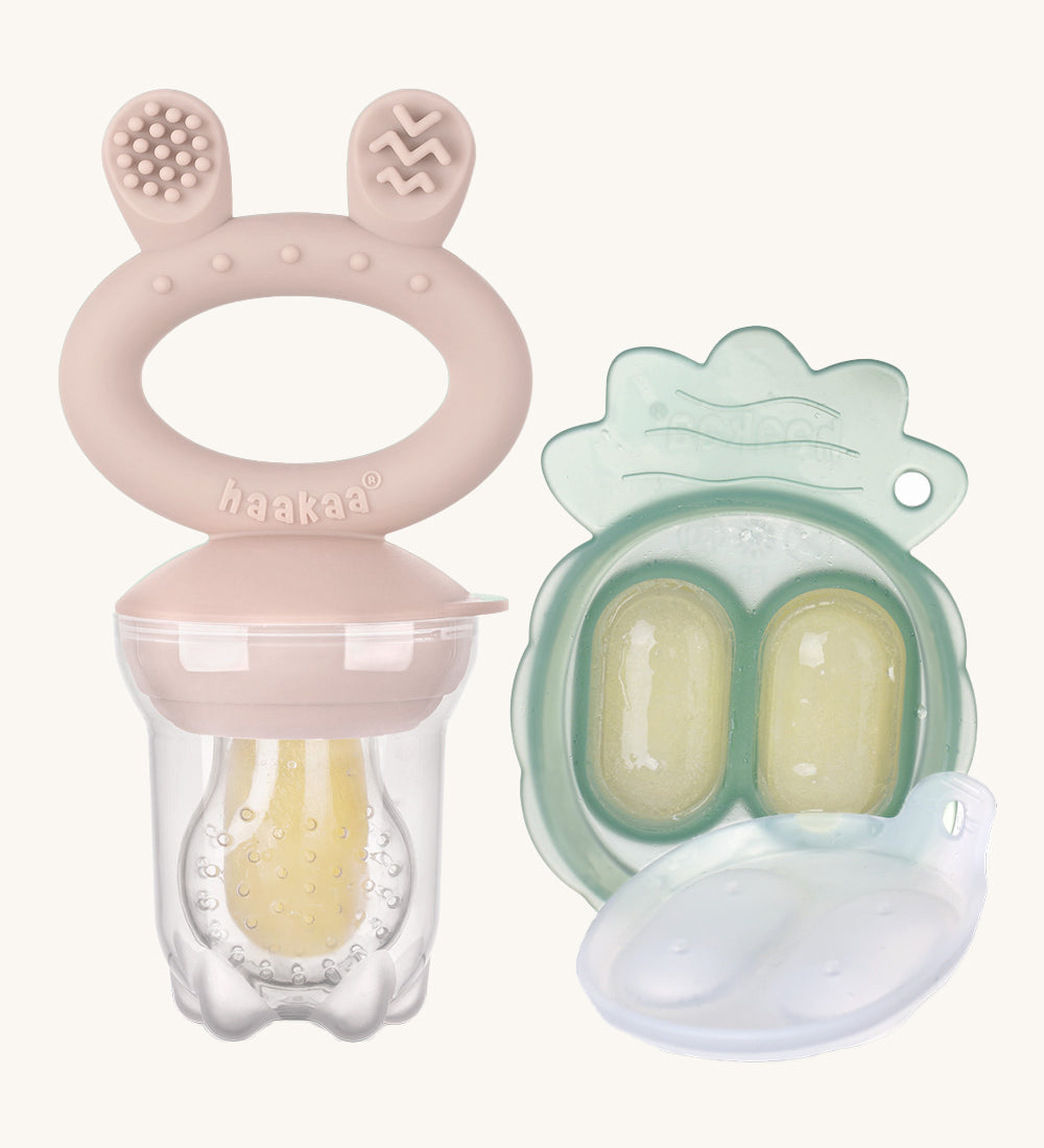 The Haakaa Fresh Food Feeder Mini Freeze and Feed set in punk, comes with a Nibble Tray, and a feeder. Both are freezable and the feeder is textured to sooth teething and sore gums