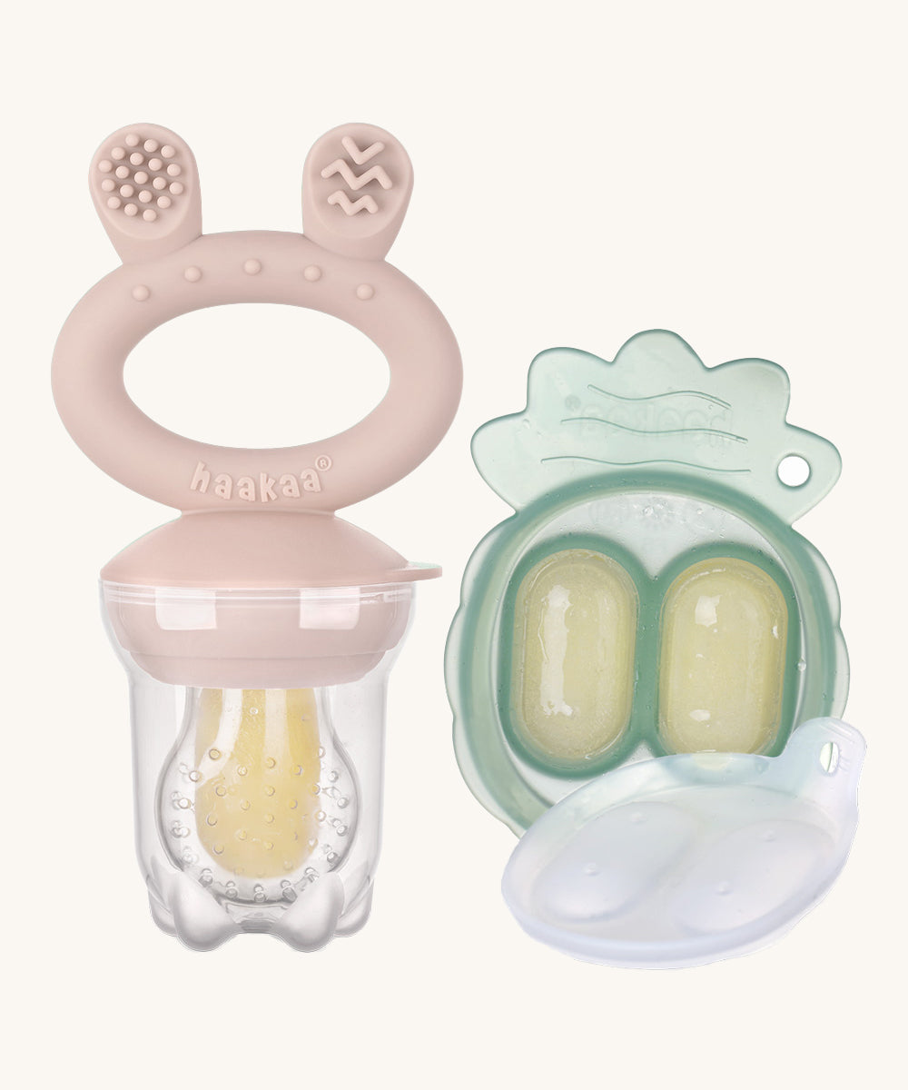 The Haakaa Fresh Food Feeder Mini Freeze and Feed set in punk, comes with a Nibble Tray, and a feeder. Both are freezable and the feeder is textured to sooth teething and sore gums