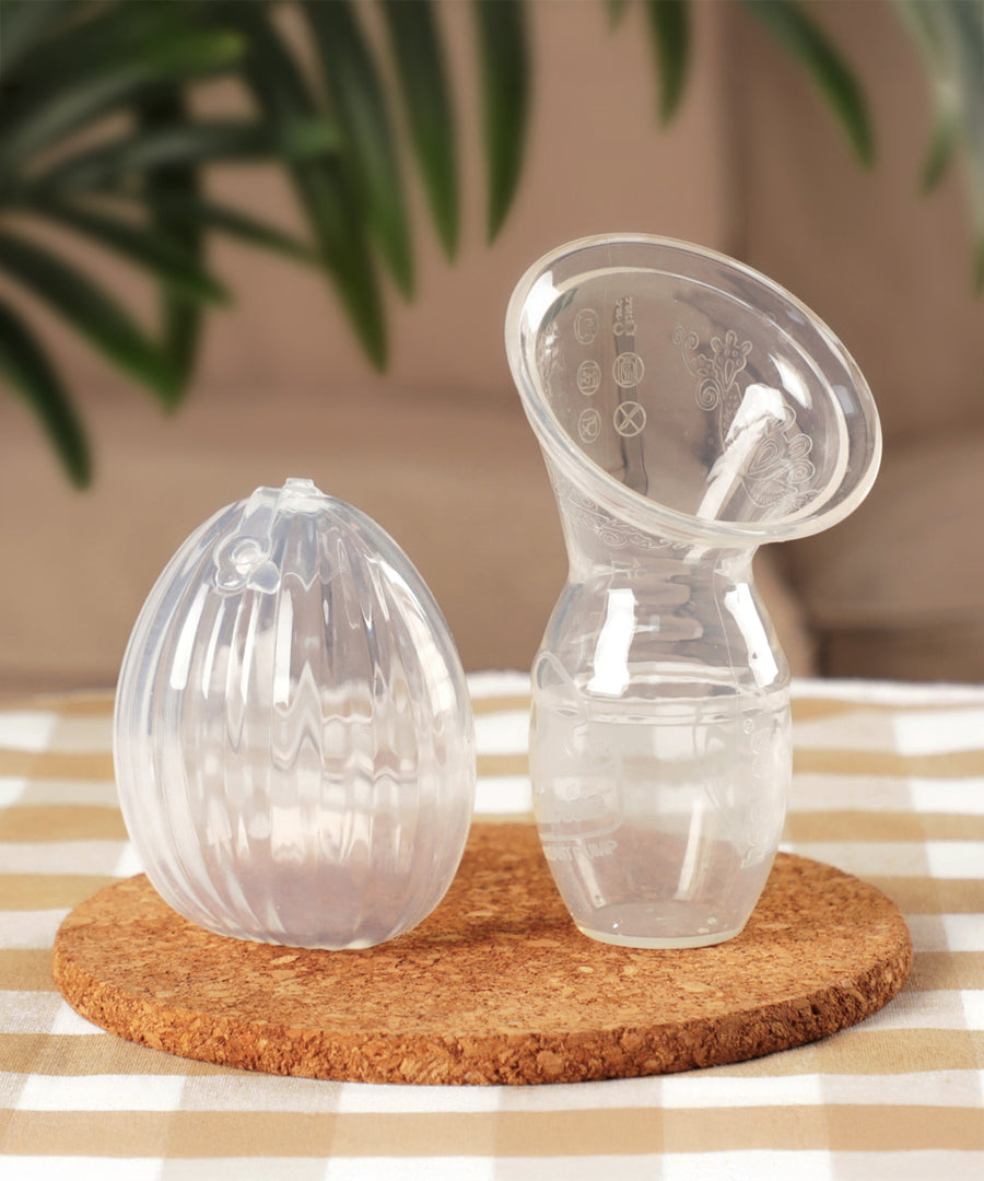 The Generation 1 100ml Silicone Breast Pump, and the Haakaa Silicone Shell Breast Pump and Milk Collector side by side