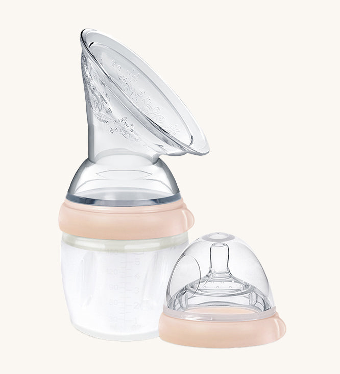 Generation 3 160ml Breast Pump and Baby Bottle Top Set, in peach on a cream background. This set come with the Haakaa Gen. 3 Silicone Breast Pump and Baby Bottle Top.