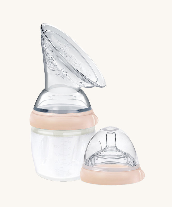 Generation 3 160ml Breast Pump and Baby Bottle Top Set, in peach on a cream background. This set come with the Haakaa Gen. 3 Silicone Breast Pump and Baby Bottle Top.