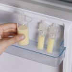 The Haakaa Silicone Colostrum Collector, being stored in the fridge