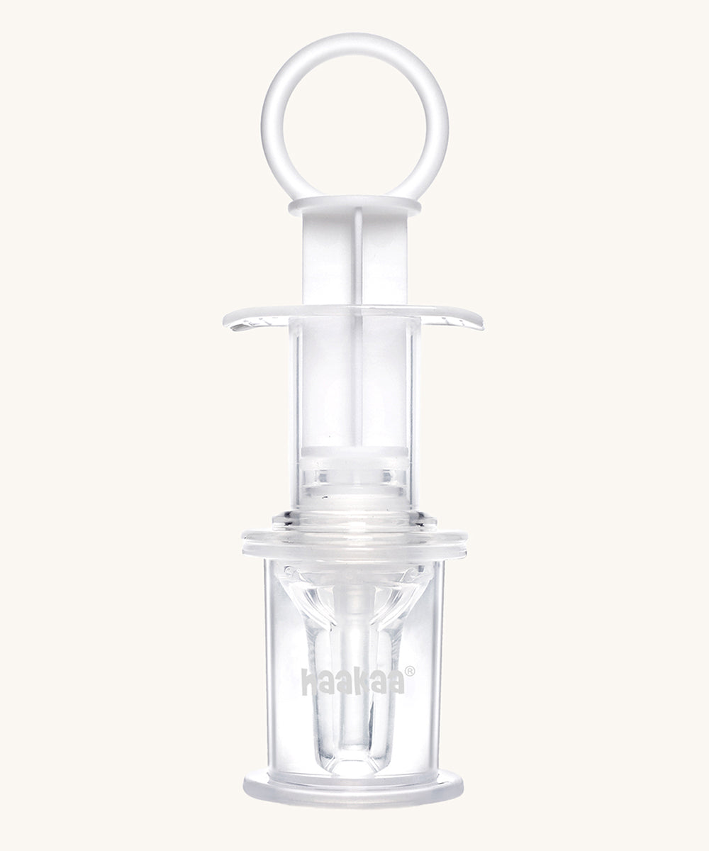 The Haakaa Oral Feeding Syringe with a soft silicone nipple. A perfect way to administer milk, liquid diets and larger quantities of medicine to premature babies. The syringe also has a 20ml cap to hold liquids