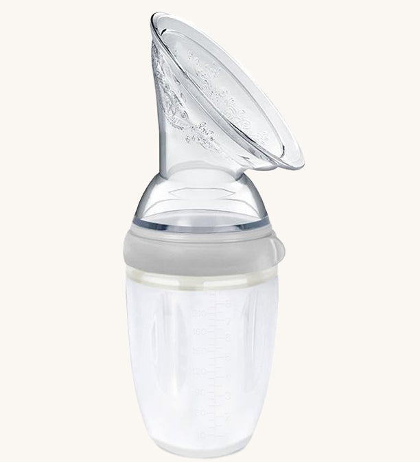 The Generation 3 250ml Silicone Breast Pump in grey on a cream background