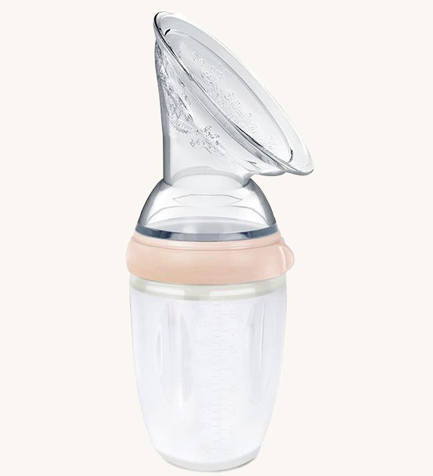 Generation 3 250ml Silicone Breast Pump in peach on a cream background